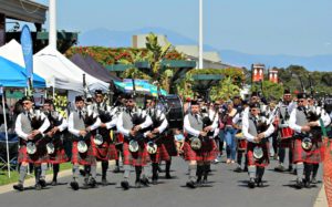 St. Patrick's Day Wedding Irish Theme
Bagpipe band marching in a parade wearing red kilts