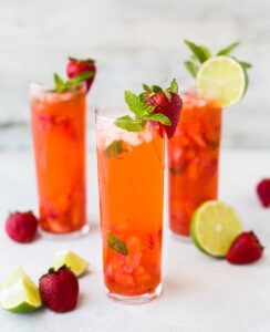 3 strawberry flavored mocktails with lime garnish and strawberries
wedding reception drink options